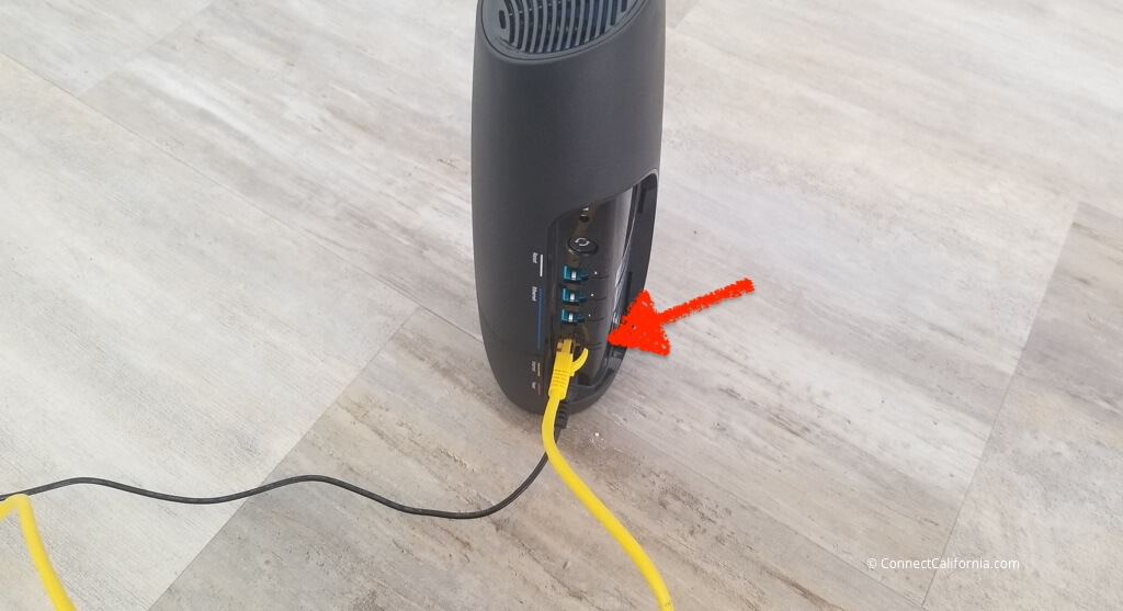 Back of Spectrum WiFi 6 router, showing ethernet cable port.